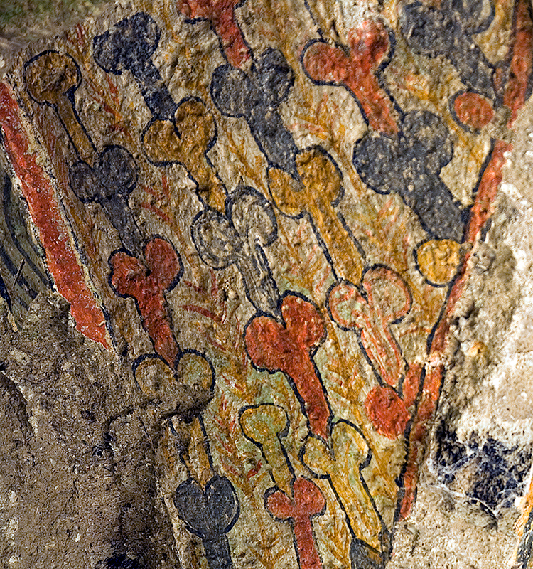 Curious phallic symbols above the altar